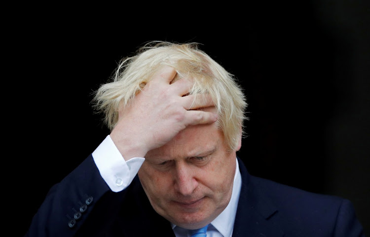 Britain's Prime Minister Boris Johnson gestures as he meets Ireland's Prime Minister (Taoiseach) Leo Varadkar (not pictured) in Dublin, Ireland, September 9, 2019. REUTERS/Phil Noble/File Photo