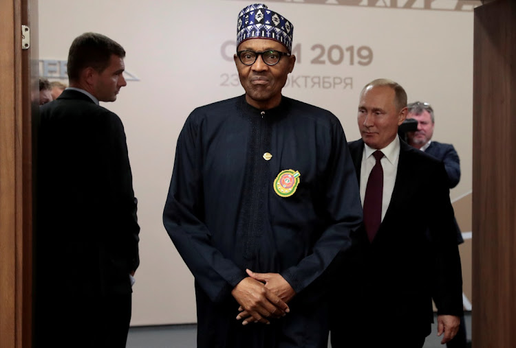 Nigerian President Muhammadu Buhari (centre) and Russian President Vladimir Putin (right) at the Russia-Africa Summit and Economic Forum in Sochi, Russia, October 23 2019. Picture: REUTERS/SERGI CHIRIKOV