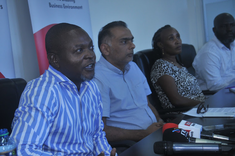 KNCCI Mombasa Chapter directors; Geoffrey Samora, Hassan Meghji and Wanjiku Wambugu at the KNCCI Mombasa office on Wednesday