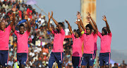 Black Leopards players celebrate after gaining promotion to the Absa Premiership. 