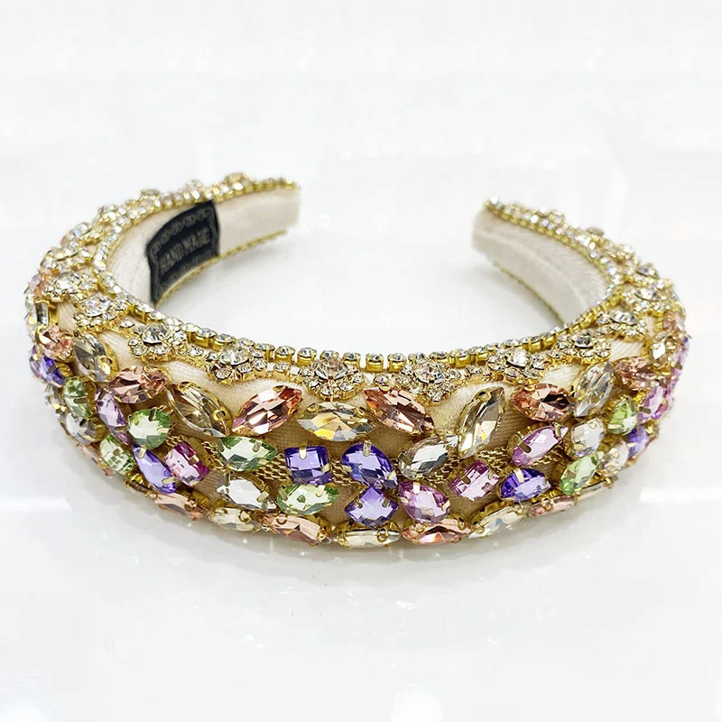 Dames haarband met brede strass steentjes zijkant, catwalk trendy, modieuze haarband, ideaal voor een stijlvolle en glamoureuze uitstraling.