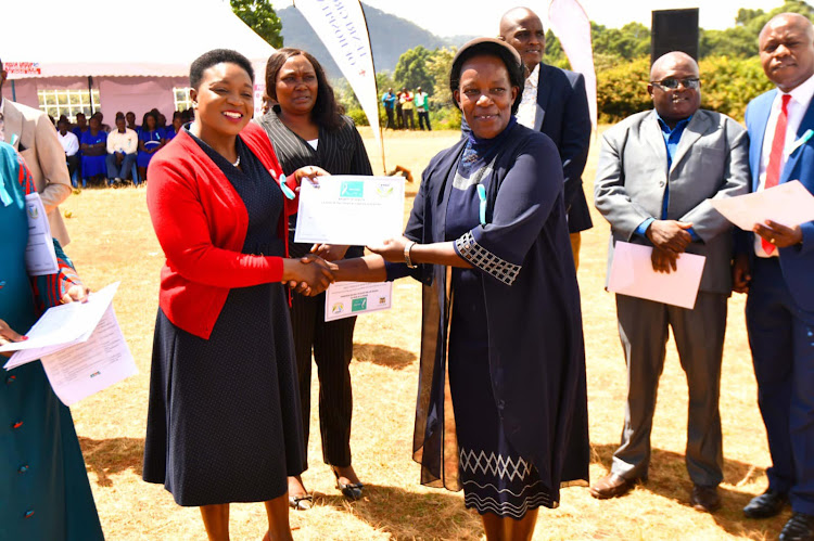 Health CS Susan Nakhumicha Wafula and a cervical cancer champion during the official launch of the cervical cancer awareness month in Embu county on January 27, 2023