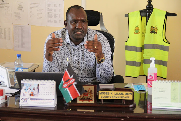 Homa Bay county commissioner Moses Lilan in his office