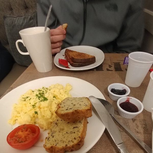 Gluten free heaven!!! Scrambled eggs and GF toast with jam. Sweetest staff ever!