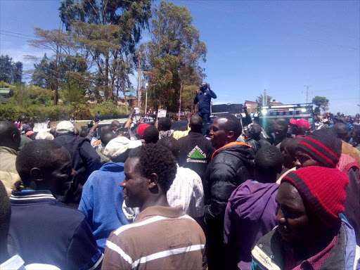 Elgeyo Marakwet Senator Kipchumba Murkomen calms rowdy residents in Iten after cancellation of JP primaries on Friday. /STEPHEN RUTTO