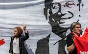 Supporters of Istanbul Mayor, Ekrem Imamoglu, demonstrate in front of a court house as a Turkish court is expected to reach a verdict in the trial of Imamoglu, who is accused of insulting state officials with comments he made at the time of elections in 2019, with prosecutors seeking the imposition of a political ban on him, in Istanbul, Turkey, June 1, 2022.  