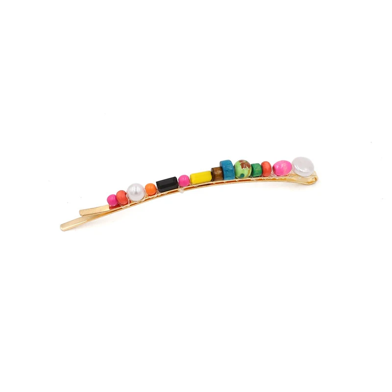 Conjunto de grampos étnicos artesanais em madeira colorida. Acessório de cabelo único para penteados estilosos e elegantes. Realce sua beleza natural.