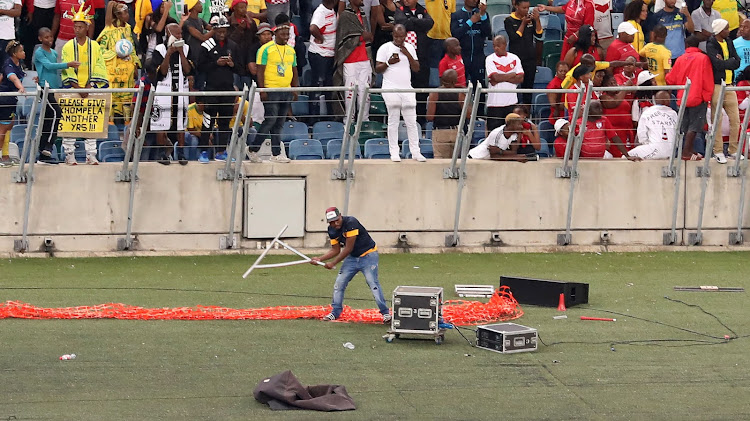 Fans set the Moses Mabhida Stadium seats on fire in Durban and vandalise property and broadcast equipment after Kaizer Chiefs lost a Nedbank Cup semi final match against unfancied Free State Stars on April 21 2018.