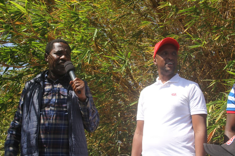 Agriculture CS Peter Munya with Jubilee candidate for Isiolo Governor Abdi Guyo.