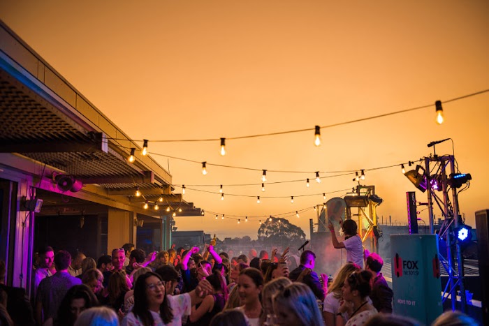 people dancing at an outdoor music show