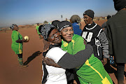 Players hug players after   a game.