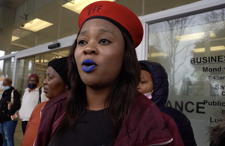 Zandile Maweza speaks outside Wynberg magistrate's court after the appearance of 11 suspects alleged to have murdered her boyfriend Abongile Mafalala.