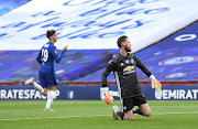 Chelsea's Mason Mount celebrates scoring their second goal as Manchester United goalkeeper David de Gea looks dejected during a FA Cup semi-final match at Wembley on July 19 2020.  