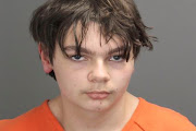 Ethan Crumbley, 15, charged with first-degree murder in a high school shooting, poses in a jail booking photograph taken at the Oakland County Jail in Pontiac, Michigan, U.S. December 1, 2021. 