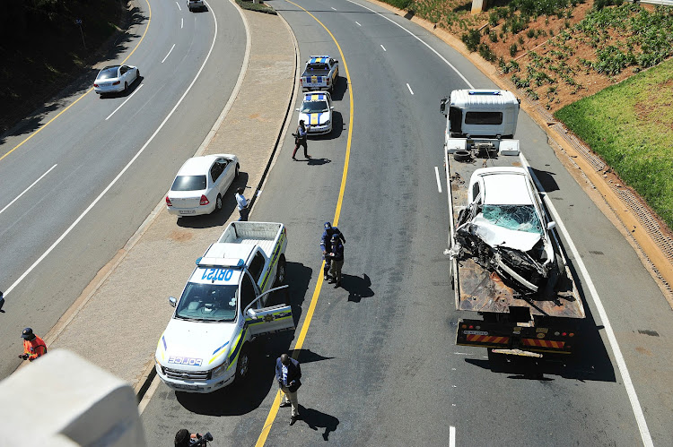 The car driven by Bosasa CEO Gavin Watson is being transported from the accident scene where Watson was reportedly killed near the O.R Tambo International Airport on August 26, 2019 in Johannesburg, South Africa.