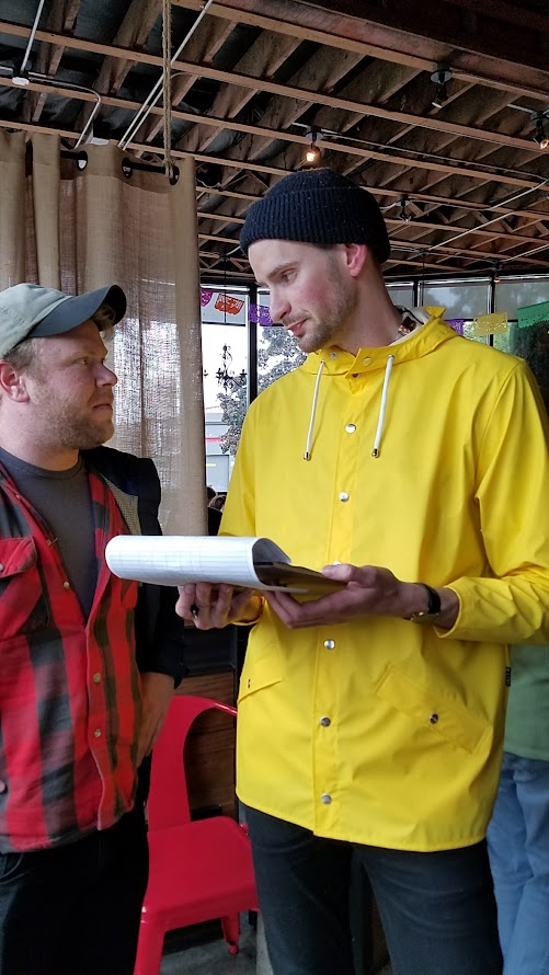 Man with the waiting list at pop up Shipwreck PDX at Taqueria Nueve