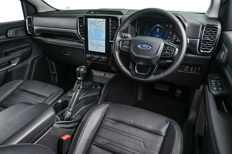 The large cockpit of the XLT is seen here with optional leather covering and its more conventional gear-lever compared to the Wildtrak. Picture: SUPPLIED