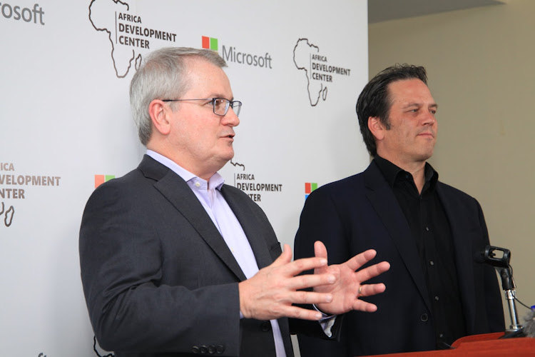 Gaming executive VP Phil Spencer and Cosine Data and Intelligence corporate VP Michael Fortin