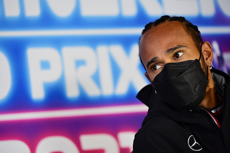 Lewis Hamilton talks in the drivers' press conference during previews ahead of the F1 Grand Prix of The Netherlands at Circuit Zandvoort.