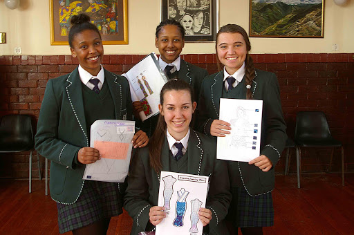 BUDDING DESIGNERS: Clarendon High girls whose creations will be modelled at the Da Gama competition include Taylyn Napoleon, Zaibun Abdool, Claudelle McKay and, front, Shanna Howarth Picture: SUPPPLIED