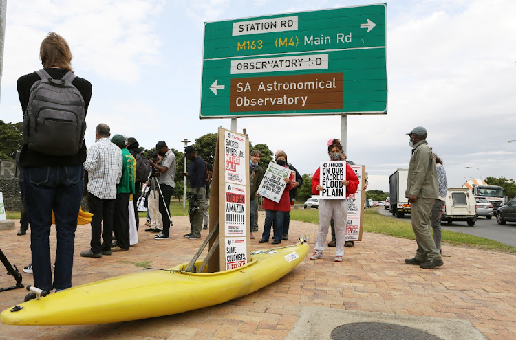 Protesters outside the Black River park development by Amazon.