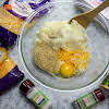 Thumbnail For Potatoes, Mexican Cheese, Cheddar Cheese, Salt, Pepper, Egg, And Bread Crumbs Combined In A Bowl.