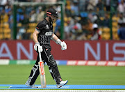 New Zealand's Kane Williamson walks after losing his wicket, caught by Pakistan's Fakhar Zaman off the bowling of Iftikhar Ahmed.