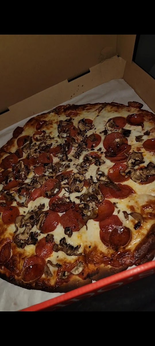 Gluten-free ( gf ) pepperoni and mushroom pizza