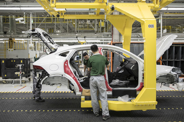 Employees assemble a Jaguar E-Pace at the Chery Jaguar Land Rover plant in Changshu, China. Sales from China used to account for 25% to 30% of JLR's global sales, but over the past two months make up 50%.