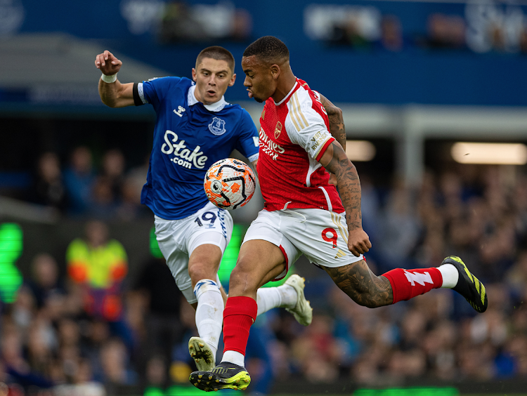 Arsenal's Gabriel Jesus (R) is challenged by Everton's Vitalii Mykolenko in a past EPL match