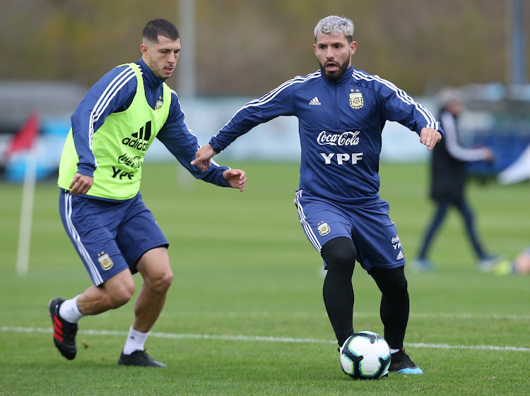 Argentina's Sergio Aguero and Guido Pizarro during a recent training session
