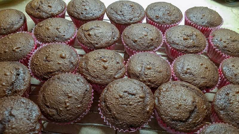 Cupcakes Cooling On A Wire Rack.