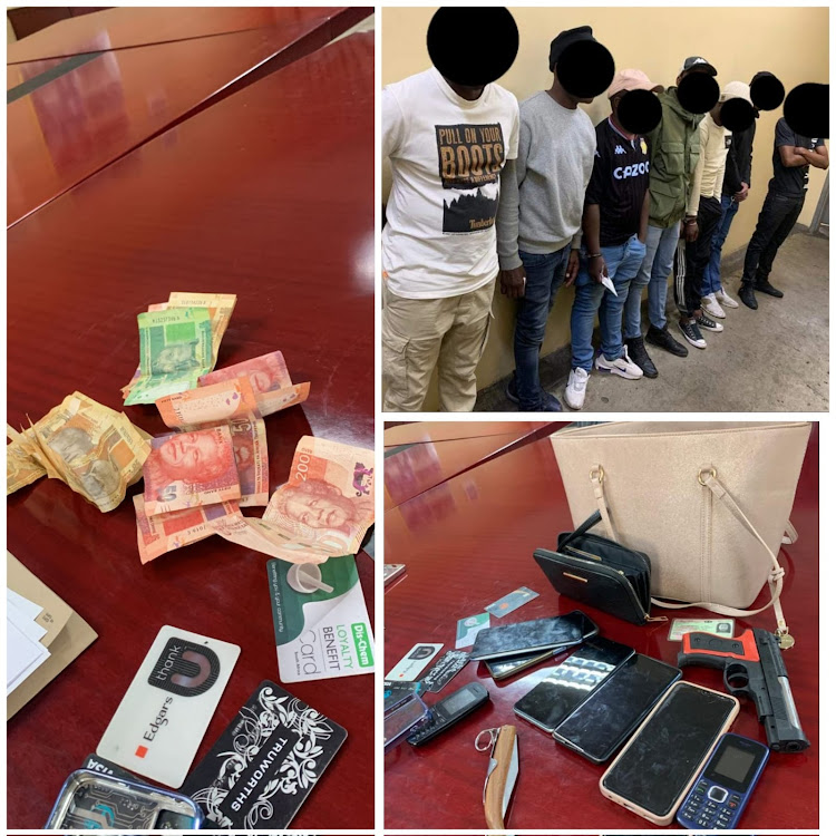 Seven suspects who were arrested by the JMPD on Tuesday and some of the alleged stolen property found in their possession.