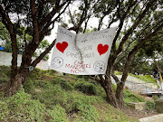 A banner is seen as protesters against the coronavirus disease (COVID-19) restrictions and vaccine mandates gather in front of the parliament in Wellington, New Zealand, March 2, 2022.