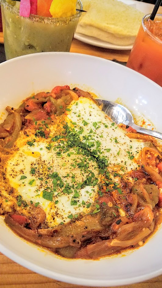 Shalom Y'all options for brunch at Pine Street Market of Shakshuka with tomatoes, peppers, baked eggs