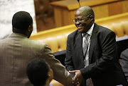 ANC members welcome former Eskom CEO Brian Molefe in the National Assembly after he was sworn in as an MP this week. He will have the use of a free house in Cape Town, if he wants it.