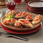 Garlic Tomato Bruschetta Recipe was pinched from <a href="http://www.tasteofhome.com/recipes/garlic-tomato-bruschetta" target="_blank">www.tasteofhome.com.</a>