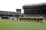 New Zealand and Australia line up for the national anthems before the second Bledisloe Cup match at Eden Park in Auckland. 