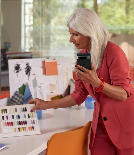 Woman working in her studio on her Pixel phone.