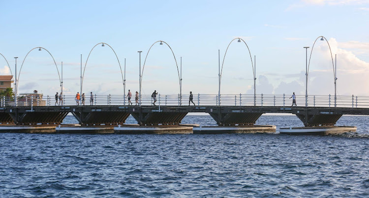 Cross the Pontoon Bridge in Willemstad, Curacao, to visit shops and restaurants. 