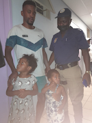 JMPD officer Tebogo Mailula and the member of the public who helped rescue the two children.