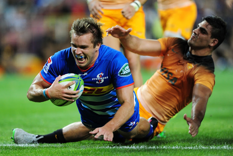 The DHL Stormers centre Dan du Plessis powers over to score a try during the Super Rugby match against the Jaguares at Newlands in Cape Town on March 15 2019.