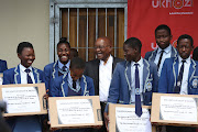 President Jacob Zuma with top achievers at the Velangaye High School in Nkandla on Wednesday.