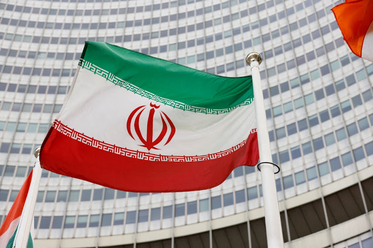 The Iranian flag waves in front of the International Atomic Energy Agency headquarters in Vienna, Austria. Picture: REUTERS/LEONHARD FOEGER