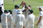 Dale Steyn of the Proteas celebrates the wicket of Imam-ul-Haq of Pakista with his team mates during day 3 of the 3rd Castle Lager Test match between South Africa and Pakistan at Bidvest Wanderers Stadium on January 13, 2018 in Johannesburg, South Africa.