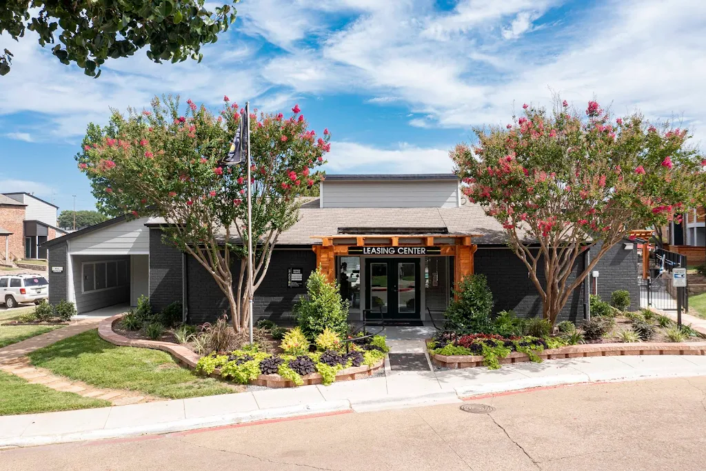 View of leasing office with landscaping