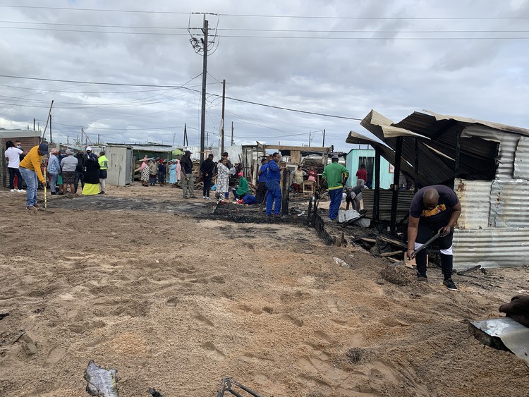 The aftermath of a fire that killed five people in Witsand near Atlantis.