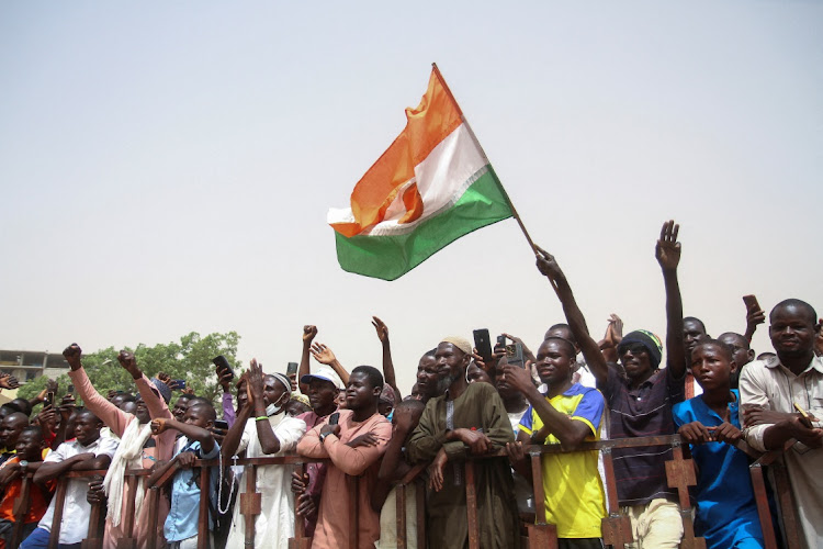 Nigeriens gather in a street to protest against the US military presence, in Niamey, Niger April 13, 2024.