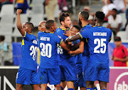 Cape Town City midfielder Roland Putsche (C) celebrates with teammates after scoring one of his two goals during a 5-0 Absa Premiership romp over Free State Stars at the Cape Town Stadium on January 16 2019.   