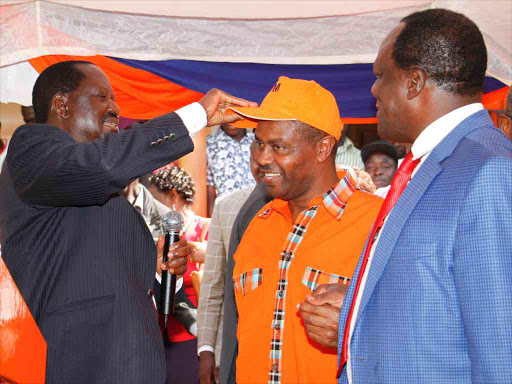 ODM leader Raila Odinga and Kakamega Governor Wycliffe Oparanya welcome Tempes Ntimama to the party during a meeting with the Youth at Orange House in Nairobi, March 28, 2017. /JACK OWUOR